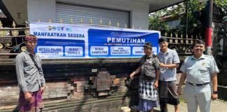 Jasa Raharja Bali Dukung Program Pemutihan Pajak dengan Pemasangan Spanduk di Pasar Desa Tihingan Klungkung jasa raharja bali